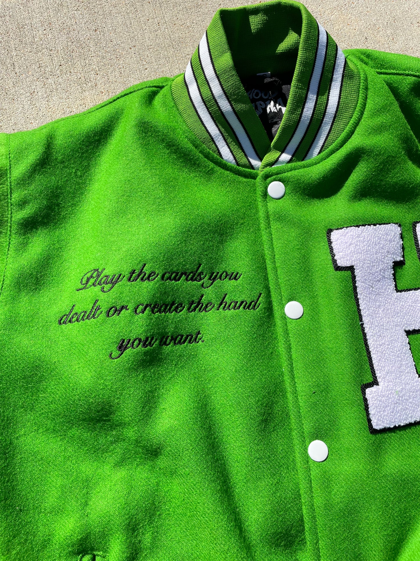 Green varsity jacket